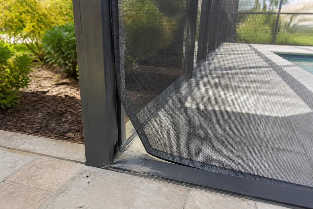A screen panel sagging away from its frame at one corner